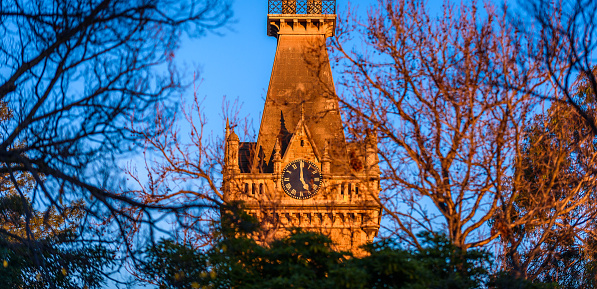 The clock tower of Ormond College at the University of Melbourne, Australia