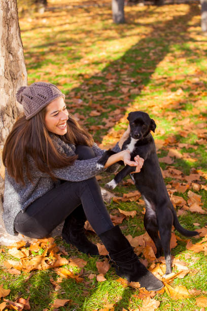 istock Young smiling woman relaxing in nature 816282076