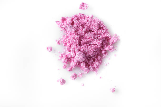 istock Crushed pink eye shadow isolated on white background 816287482