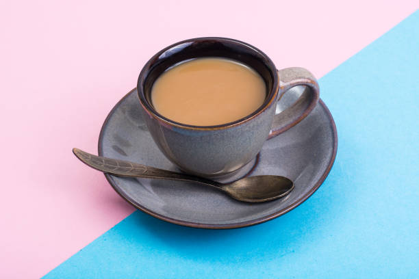 istock Cup of coffee with milk on pastel background 816302916