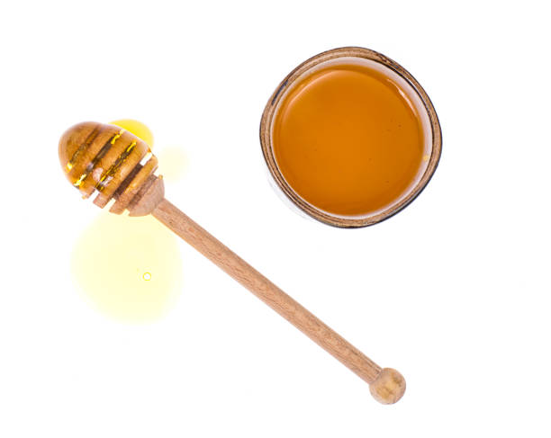 istock Honey of rose petals on white background 816311110