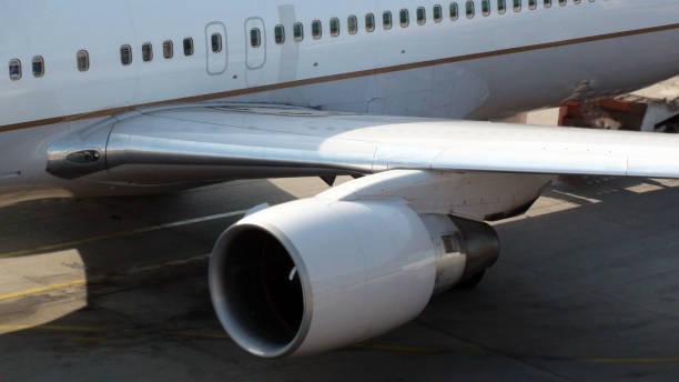 istock Parked Passengers Airplane Engine,Wing And Tire Scene 816311614