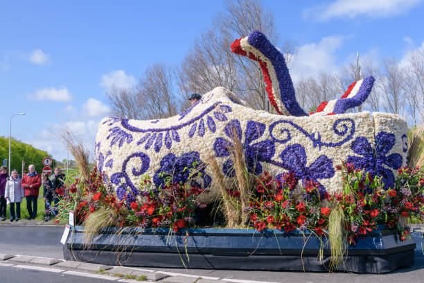 Clog from flower. Parade Bloemencorso Bollenstreek . Procession of various flowers compositions. Holiday of amazing colors and delicious flavors. Travel photo NOORDWIJK, NETHERLANDS - 23 APRIL 2016