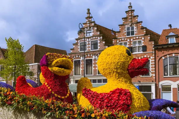 Statue made of tulips on flowers parade in Haarlem Netherlands - holiday background