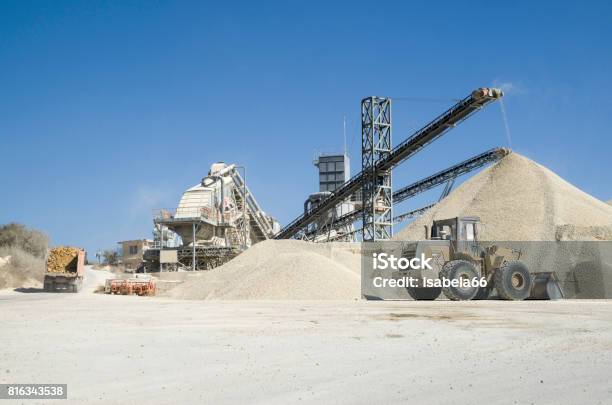 Several Working Belt Conveyors And A Piles Of Rubble In Gravel Quarry Stock Photo - Download Image Now