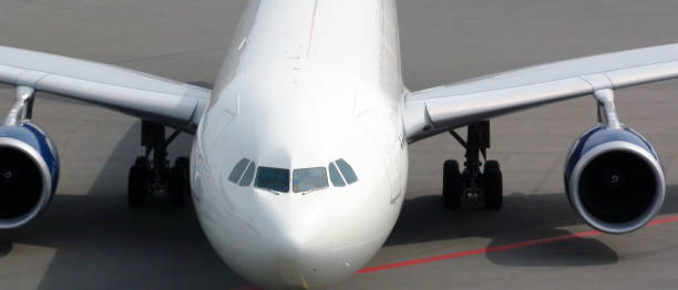 istock Close Up View Of Airplane Tire,Nose Cone,Engine And Wing 816371860