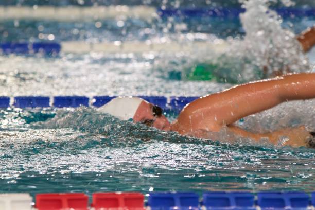 istock YOung boy competing in freestyle swim meet 816378512