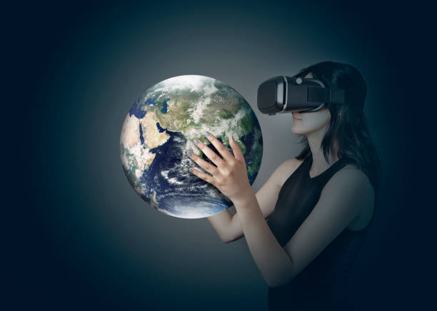 istock A young woman touching a virtual World  using Virtual Reality glasses. 816397222