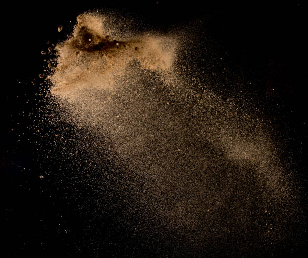 istock Sandy explosion isolated on over dark background,Abstract sand cloud,Motion blur 816397340