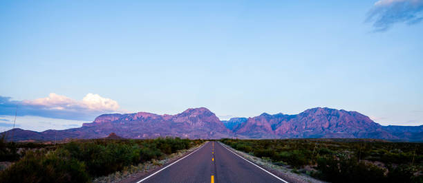 istock Lonely road to the mountains 816402360