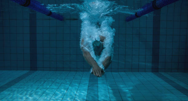 istock Fit swimmer training on his own 816446704