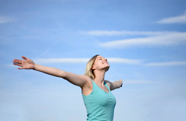 istock young woman cheering 816458870