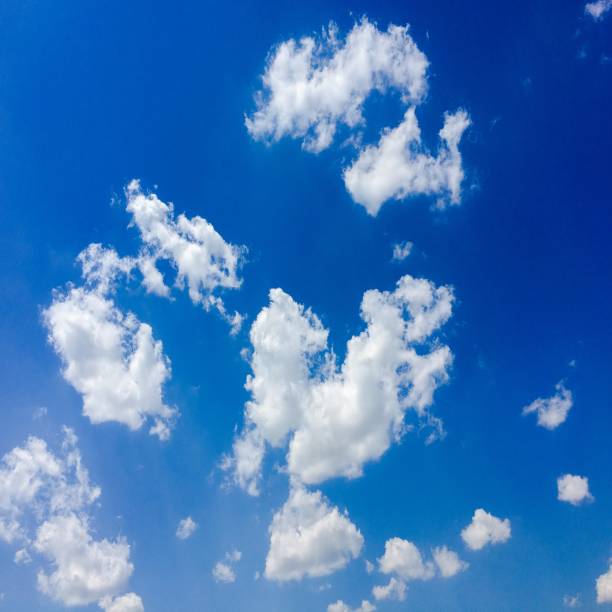 istock Isolated white clouds on blue sky. Set of isolated clouds over blue background. Design elements. White isolated clouds. Cutout extracted clouds 816461036