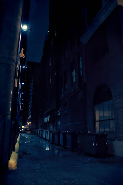 istock Dark City Alley at Night 816461078