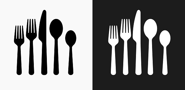 Utensils Icon on Black and White Vector Backgrounds. This vector illustration includes two variations of the icon one in black on a light background on the left and another version in white on a dark background positioned on the right. The vector icon is simple yet elegant and can be used in a variety of ways including website or mobile application icon. This royalty free image is 100% vector based and all design elements can be scaled to any size.