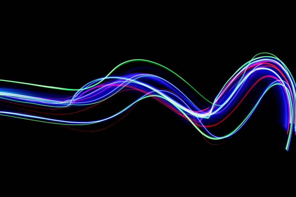 istock Multi-coloured fairy lights, light painting photography, waves and ripples pattern effect against a black background 816474576