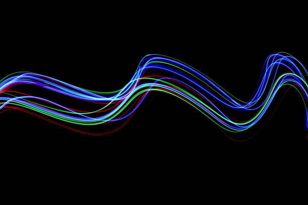 istock Multi-coloured fairy lights, light painting photography, waves and ripples pattern effect against a black background 816474614