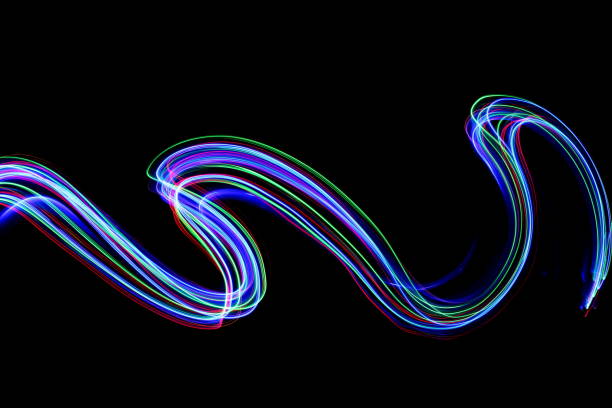 istock Multi-coloured fairy lights, light painting photography, waves and ripples pattern effect against a black background 816474826