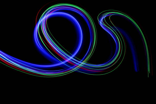 istock Multi-coloured fairy lights, light painting photography, waves and ripples pattern effect against a black background 816476692