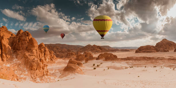 istock Hot Air Balloon travel over desert 816476820