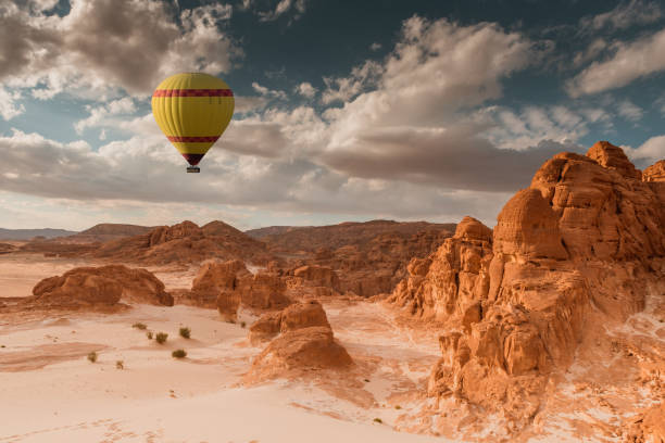istock Hot Air Balloon travel over desert 816477020