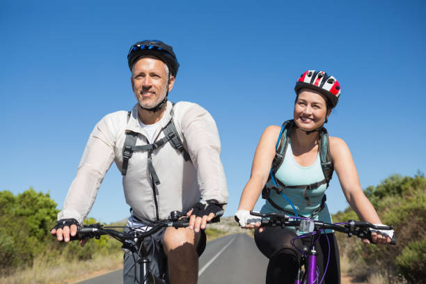 istock Active couple going for a bike ride in the countryside 816509056