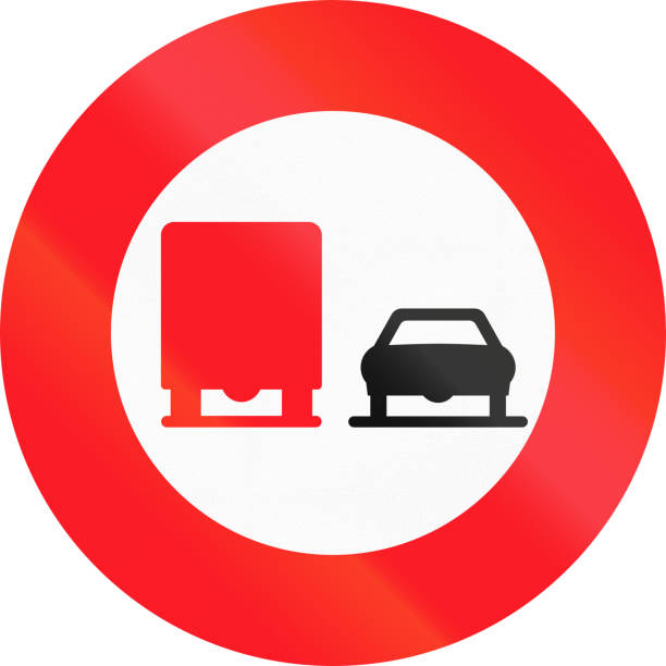 istock Road sign used in Switzerland - No overtaking by lorries 816515918