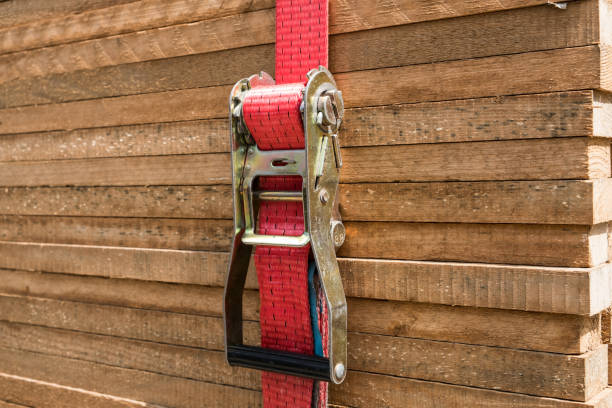 istock red ratchet strap fixing wood boards / wooden planks 816515956
