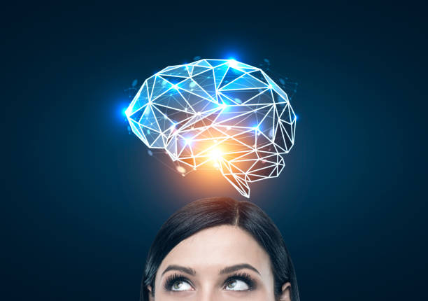 istock Black haired woman and a blue brain hologram 816528336