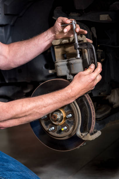 istock Master machanic works on a break system for a truck 816533048