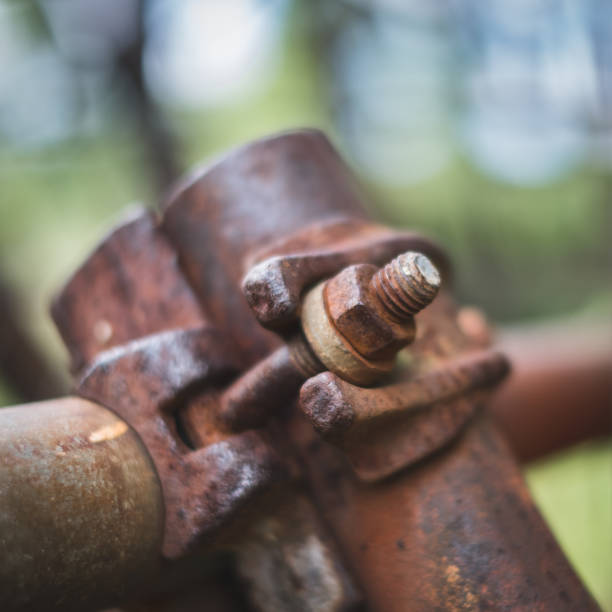 istock rusty screw and nut on scaffolding closeup 816538216