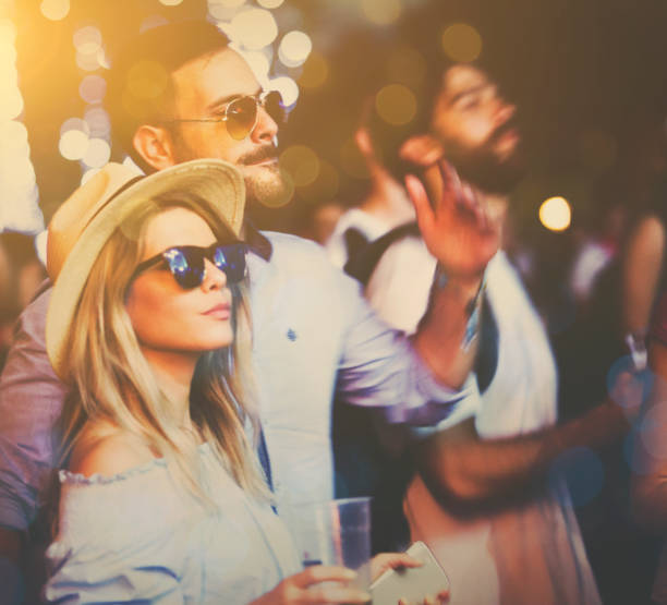 istock Young attractive couple on festival 816556538