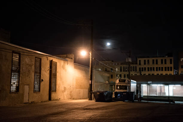 istock Dark City Alley at Night with Moon 816564236