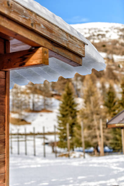 Icicles hanging from the roof in winter