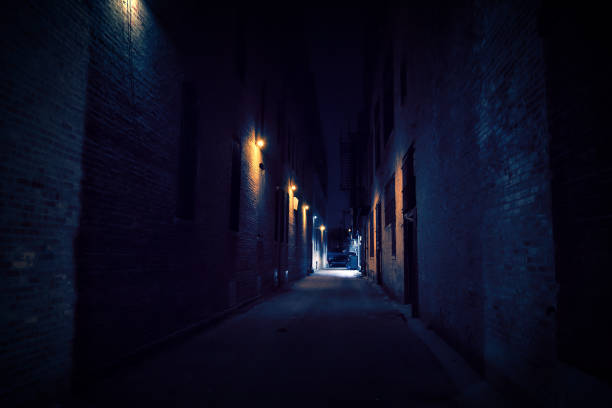 istock Dark Urban City Alley at Night 816564324