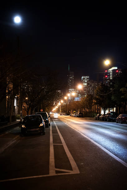 istock Dark City Street at Night with Moon 816564338