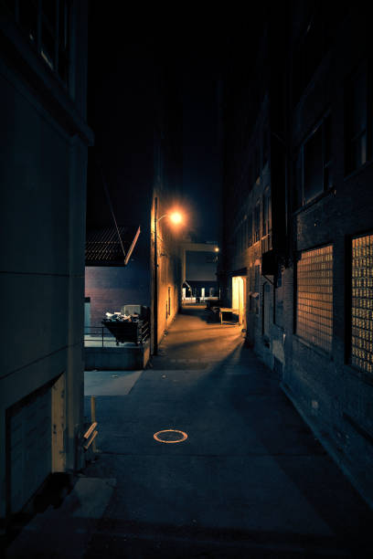 istock Dark City Alley at Night 816564384