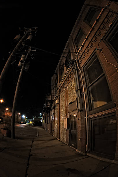 istock Dark City Sidewalk and Building at Night 816564408