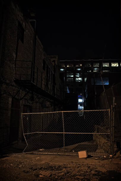 istock Dark City Alley at Night 816564430