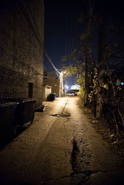 istock Dark City Alley at Night 816564542