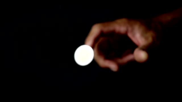 Coin flip in slow motion shot