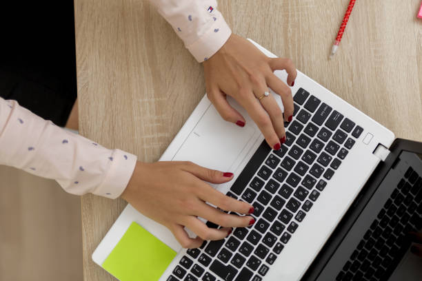 istock Businesswoman typing on her laptop 816587680
