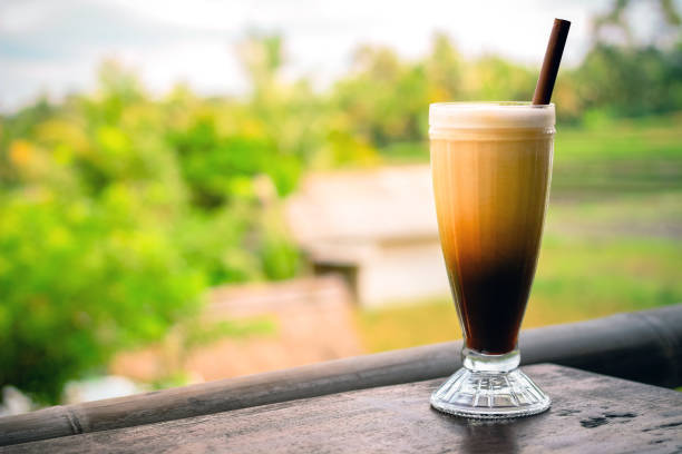 istock organic coffee with plantation background 816626320