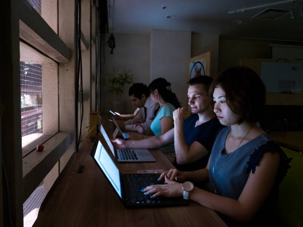 istock International business people doing night work individually 816633198