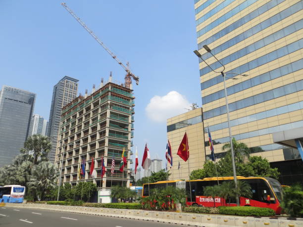 JAKARTA, INDONESIA - July 9. 2017: TransJakarta bus passing by Thamrin road.