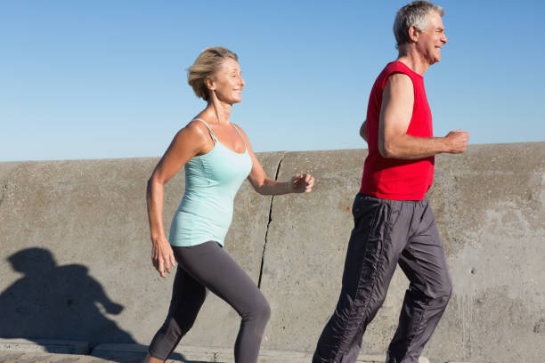 istock Active senior couple out for a jog 816645942