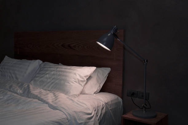 istock Modern bedroom with desk lamp 816674998