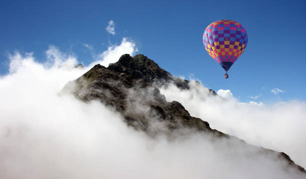 istock Hot air balloon over mountains 816682150