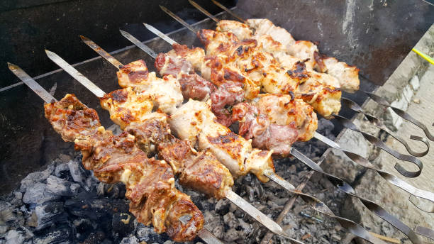 istock to prepare a delicious kebab on vacation 816686804