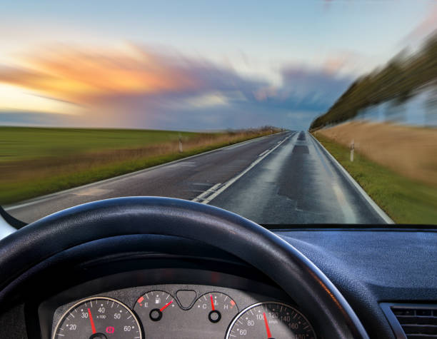 istock A view from behind the steering wheel of a car 816686848